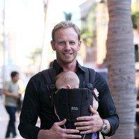 Ian Ziering carries his newborn daughter Mia Loren